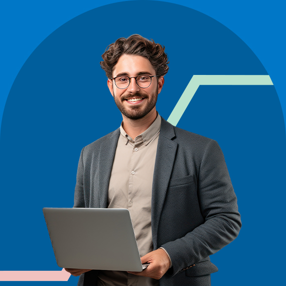 an image of a male teacher holding a laptop